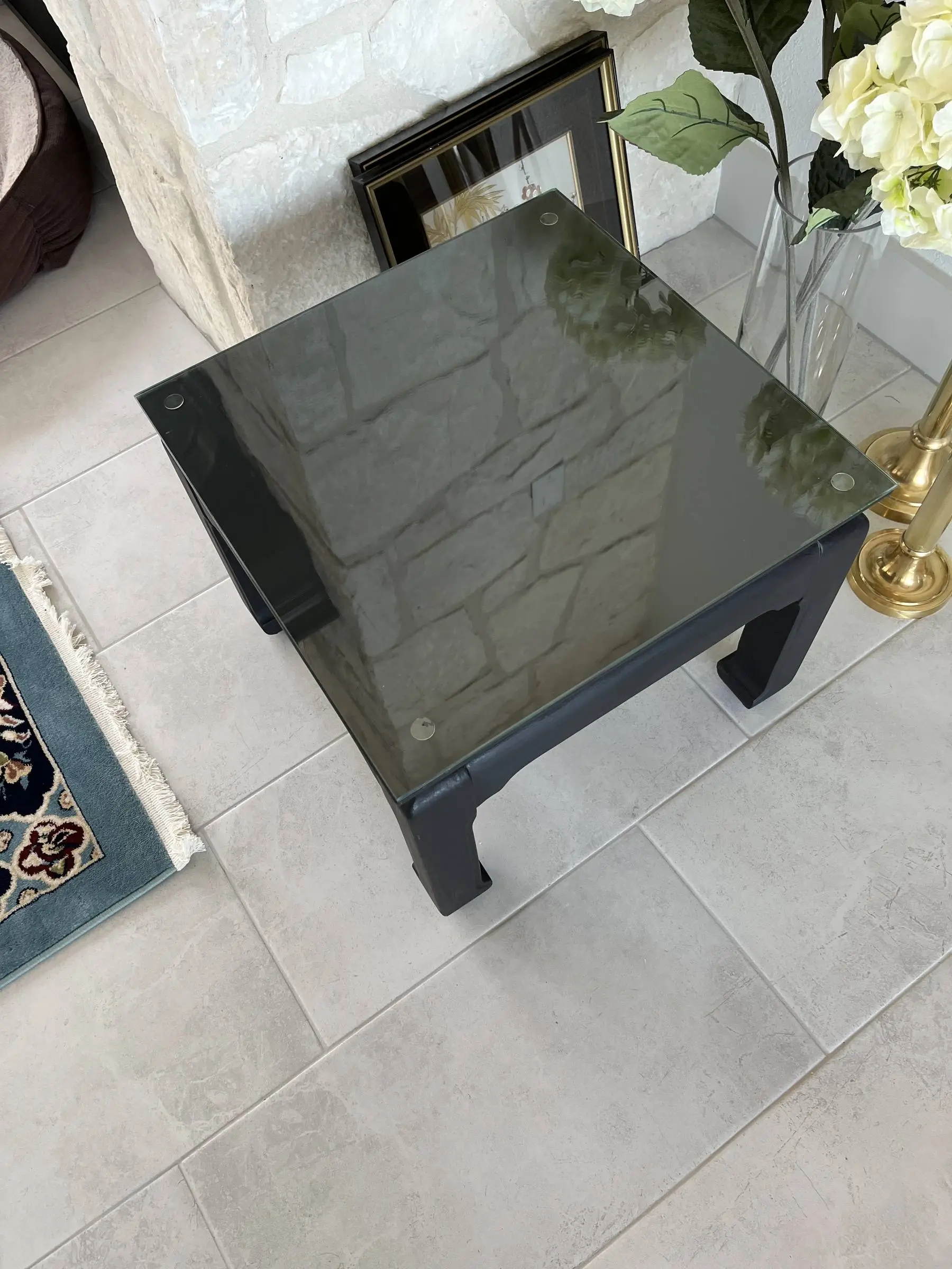 Glass-topped patio table.